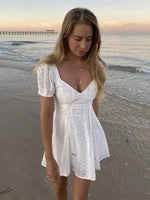 Mini Jurk met V-hals en Puff Mouwen - Group14 - Jurkjes.co