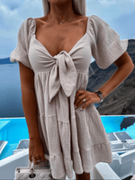 Mini Jurk met V-hals en Striksluiting - Mini Dresses - Jurkjes.co