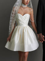 Mini Jurk met V-hals en Swarovski Bandjes - Group1 - Jurkjes.co