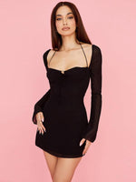 Mini Jurk met V-hals en Wijde Mouwen - Group3 - Jurkjes.co