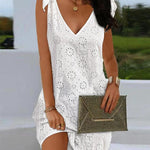 Minijurk met Broderie en Strikdetails - Dresses - Jurkjes.co